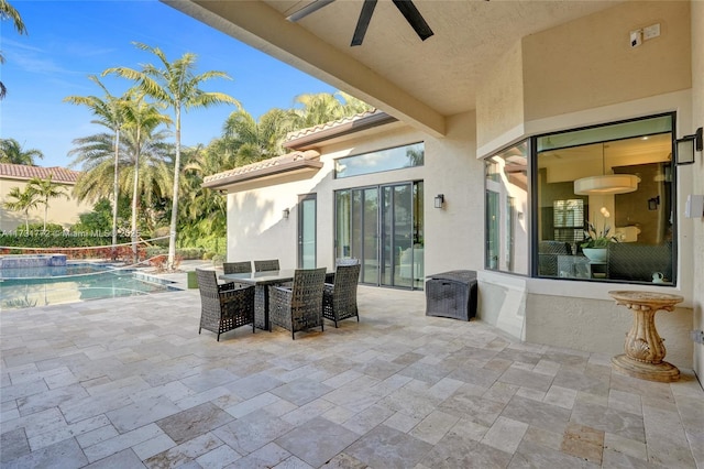 view of patio / terrace featuring ceiling fan