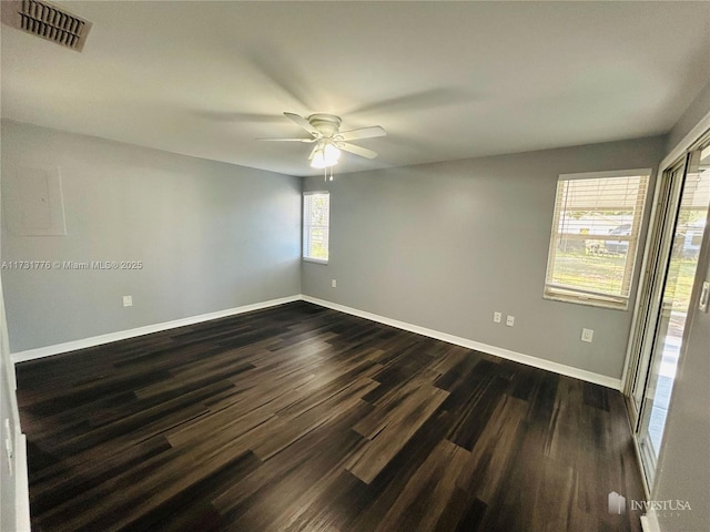 2013 Finland Dr, Spring Hill, FL 34609 - unfurnished room featuring dark hardwood / wood-style flooring and ceiling fan