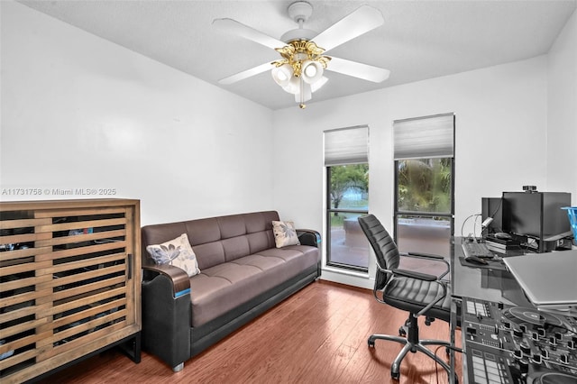 office space featuring hardwood / wood-style flooring and ceiling fan