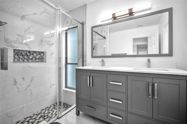 bathroom with vanity and walk in shower