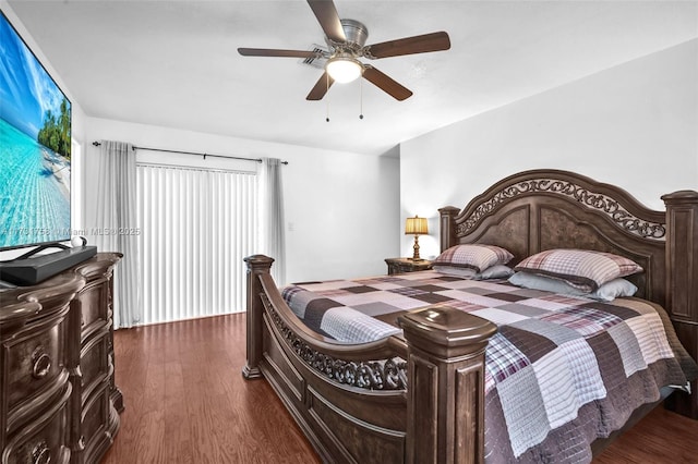 bedroom featuring ceiling fan and dark hardwood / wood-style flooring