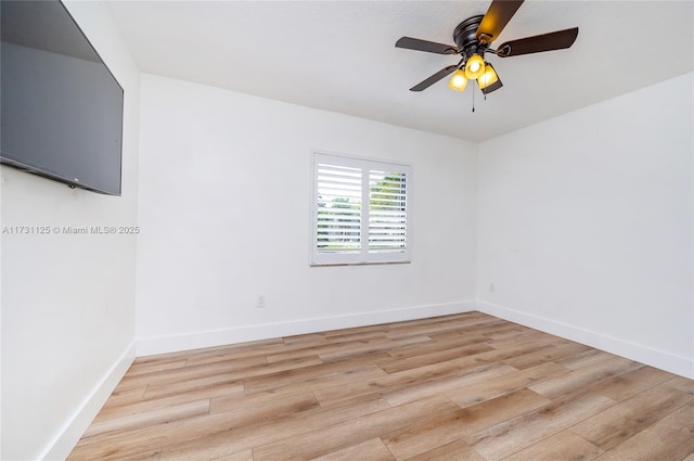 unfurnished room featuring ceiling fan and light wood-type flooring