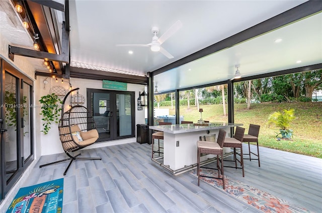 sunroom / solarium with french doors