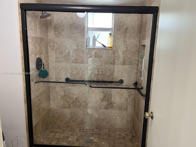 bathroom with an enclosed shower