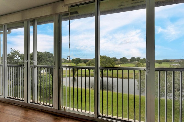 unfurnished sunroom with plenty of natural light