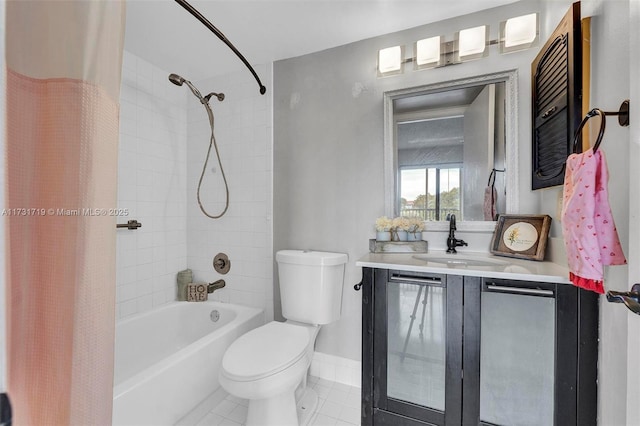 full bathroom with vanity, shower / tub combo with curtain, tile patterned floors, and toilet