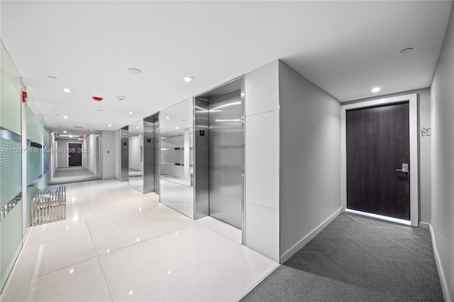 hallway featuring elevator