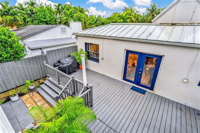 wooden deck with grilling area