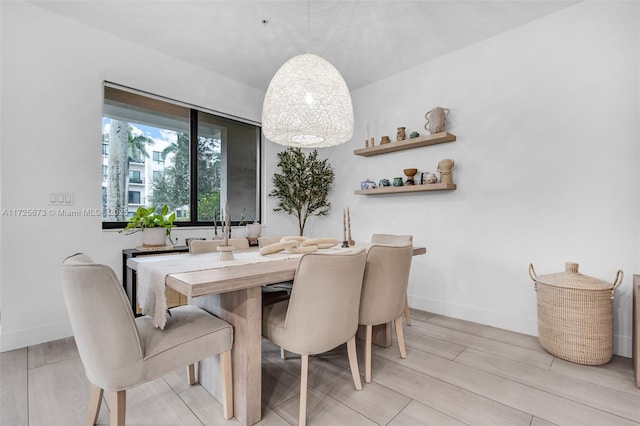 dining room featuring light hardwood / wood-style floors