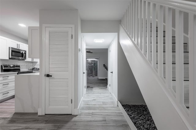 hallway featuring light hardwood / wood-style floors