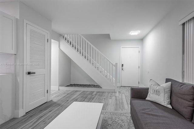 foyer with light hardwood / wood-style floors