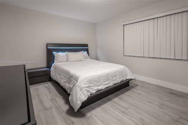 bedroom featuring light hardwood / wood-style floors