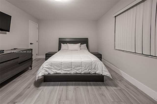 bedroom featuring light wood-type flooring