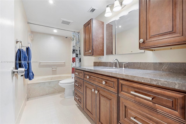 full bathroom featuring tile patterned floors, vanity, toilet, and shower / bath combo