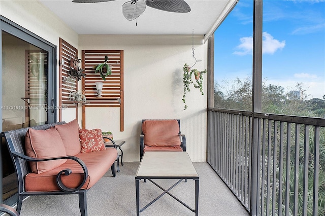 balcony featuring ceiling fan