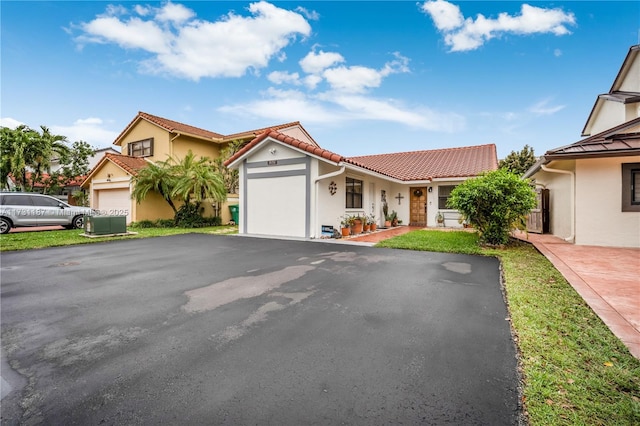 view of front of home with a garage