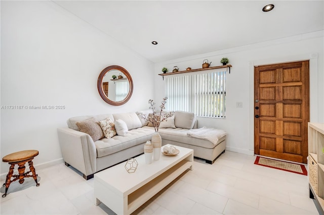 living room featuring crown molding