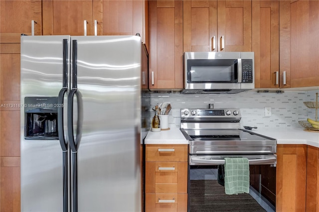 kitchen with decorative backsplash and stainless steel appliances