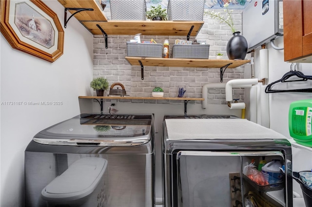 laundry area featuring separate washer and dryer