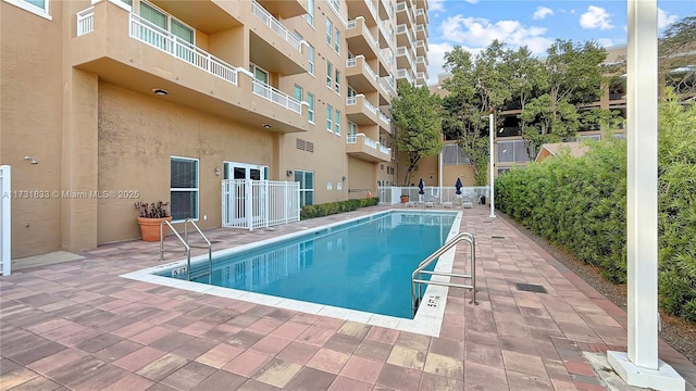 view of pool featuring a patio area