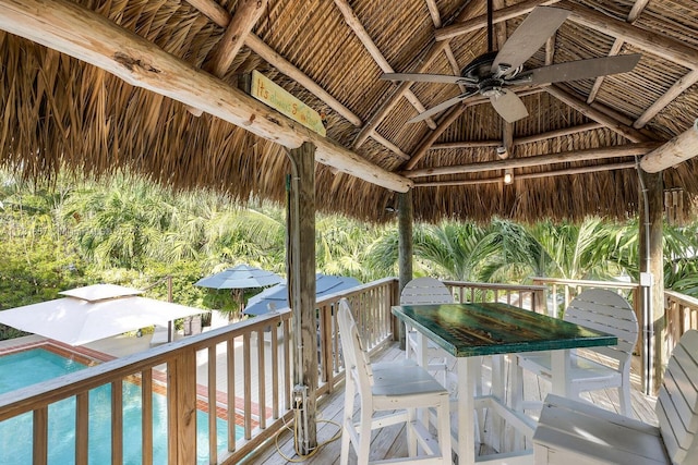 exterior space with a gazebo and ceiling fan