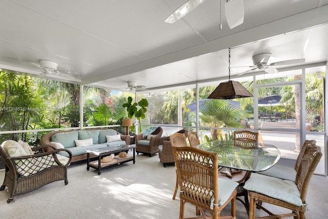 sunroom / solarium with ceiling fan