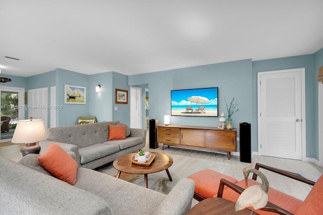 living room with light hardwood / wood-style floors