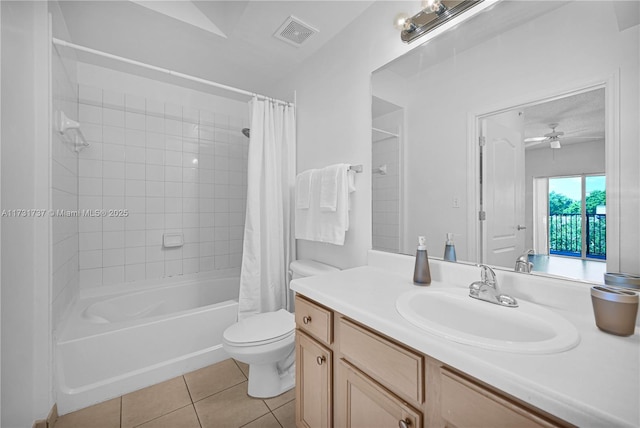 full bathroom featuring tile patterned floors, toilet, vanity, shower / bath combo, and ceiling fan