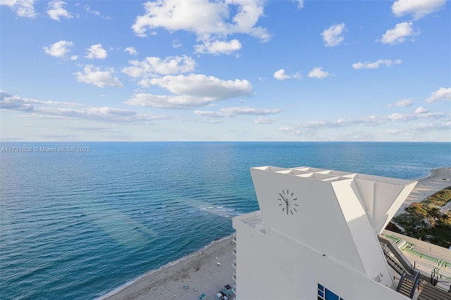 property view of water featuring a beach view