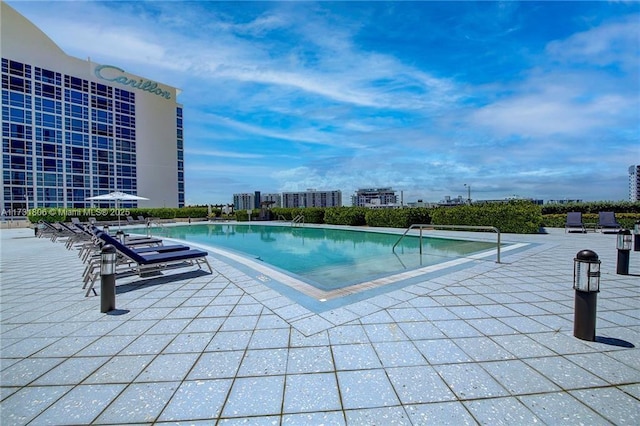 view of pool with a patio area