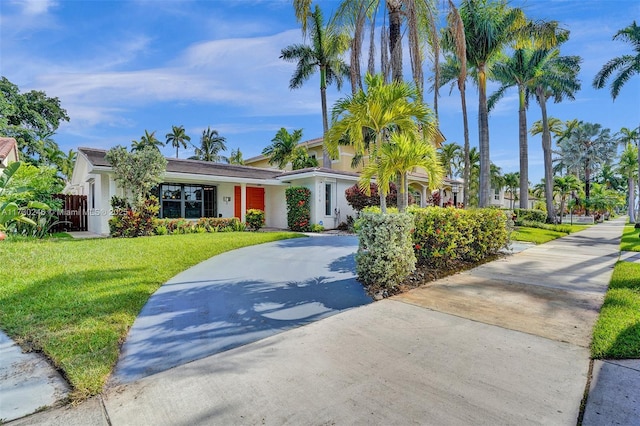 view of front of property with a front lawn