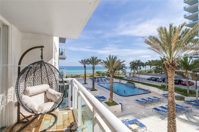 balcony featuring a water view