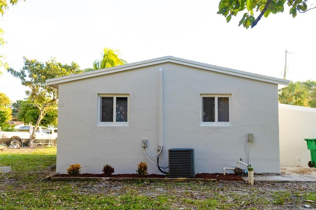 view of property exterior with cooling unit