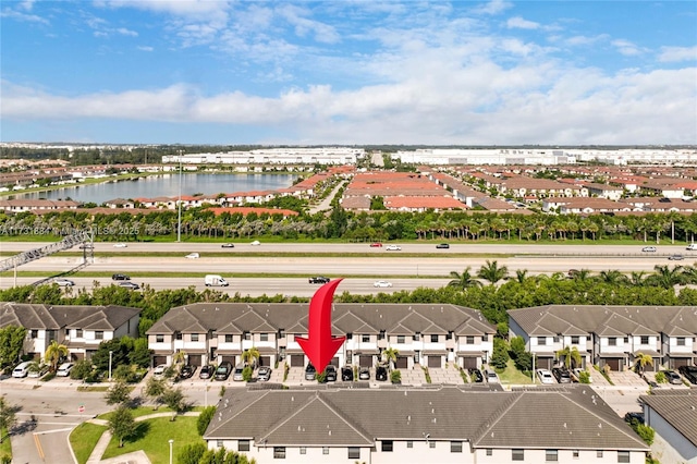 drone / aerial view featuring a water view