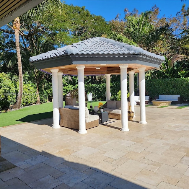 view of patio featuring a gazebo and an outdoor hangout area