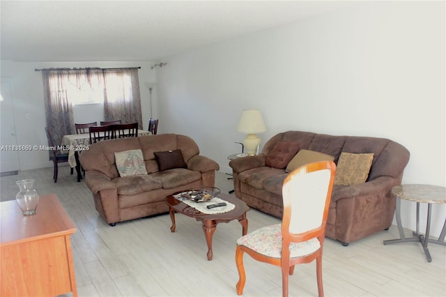 living room with light hardwood / wood-style floors