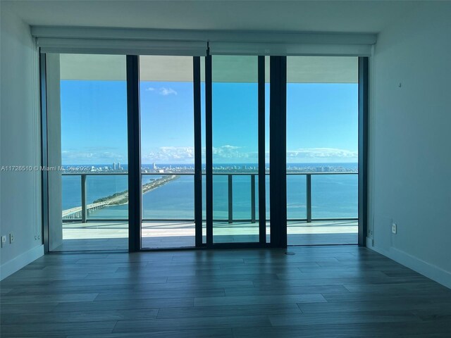 bathroom featuring a water view