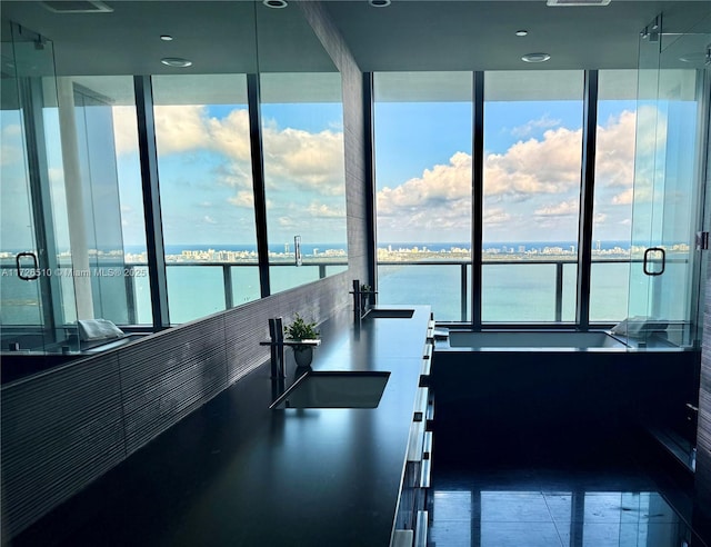 kitchen with a sink and a water view