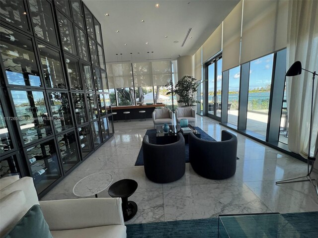 building lobby featuring a water view