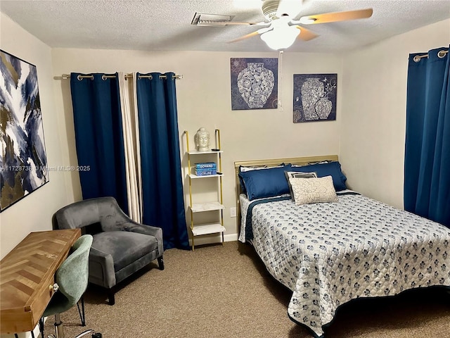 bedroom with a textured ceiling, ceiling fan, and carpet flooring