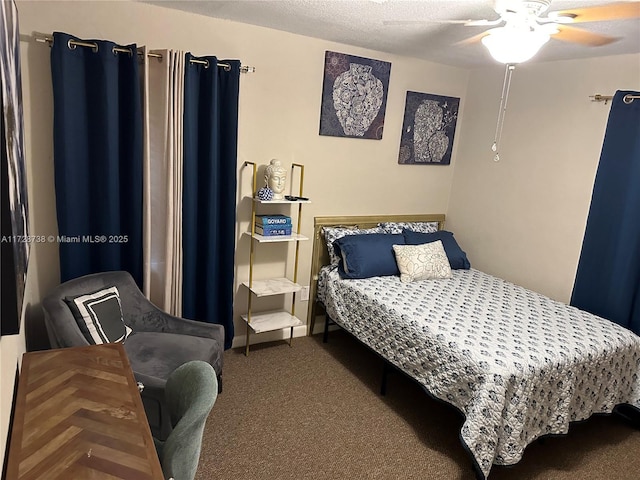 bedroom featuring a textured ceiling, ceiling fan, and carpet flooring