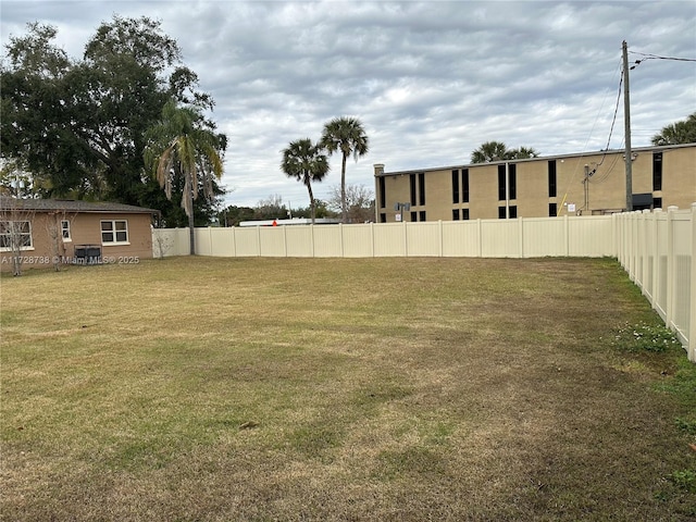 view of yard featuring central AC