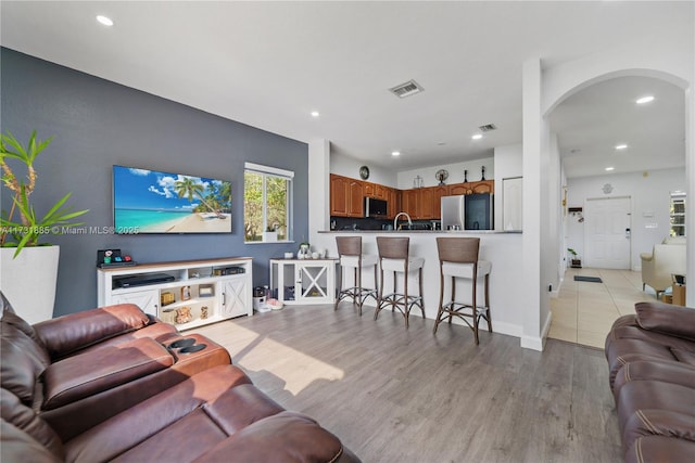 living room featuring light hardwood / wood-style flooring