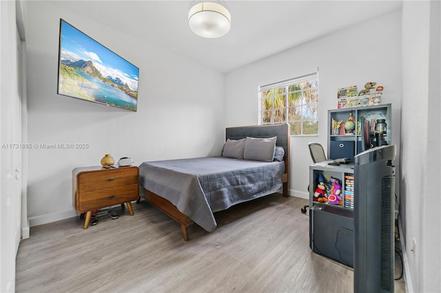 bedroom featuring light hardwood / wood-style flooring