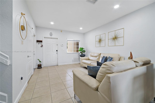 living room with light tile patterned flooring