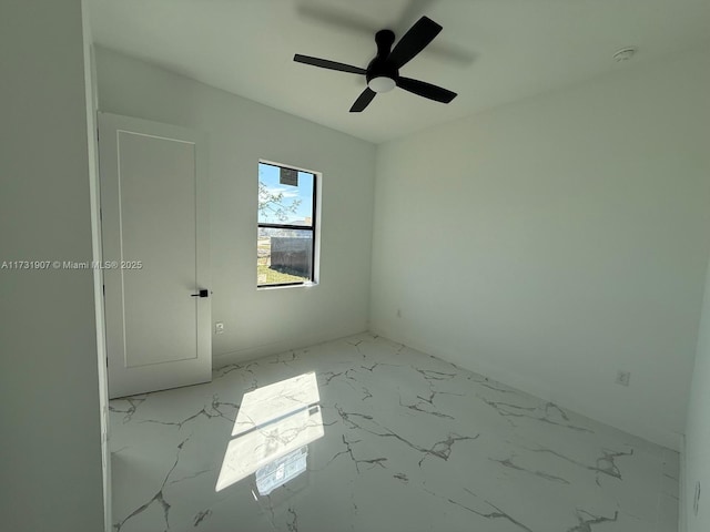 unfurnished room with ceiling fan