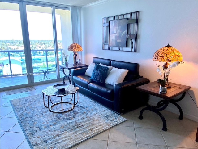 tiled living room featuring crown molding and floor to ceiling windows