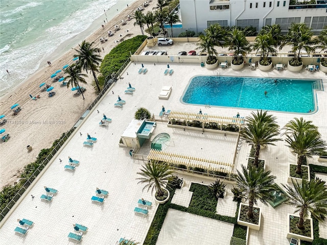 drone / aerial view with a view of the beach and a water view