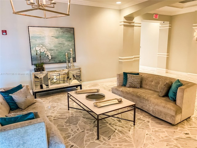 living room featuring a notable chandelier, ornamental molding, and ornate columns