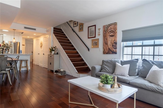 living room with dark hardwood / wood-style floors